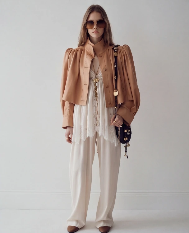 AI lookbook output showing the beige jacket outfit as a front full-body product image